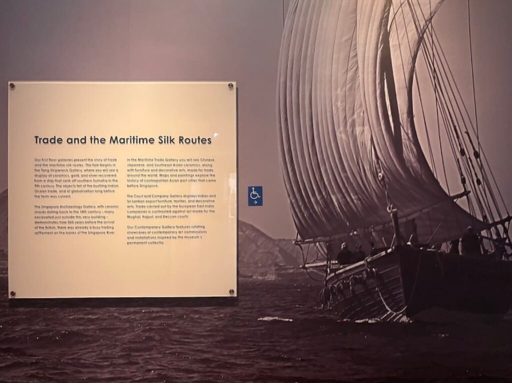 Maritime Trade gallery exhibit at Asian Civilisations Museum Singapore showing a reconstructed ship sail and display panel