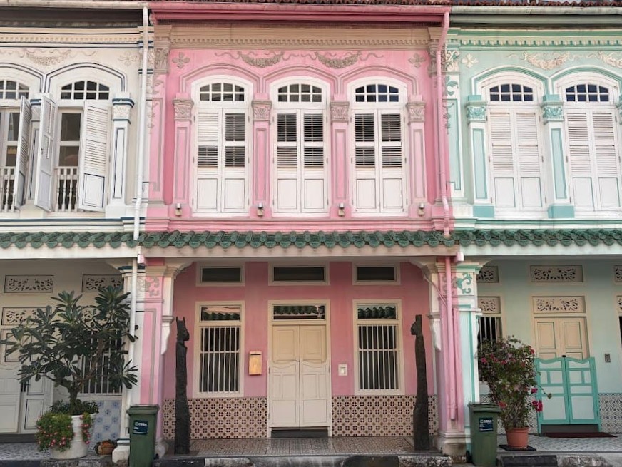 Pink and turquoise Peranakan shophouses along Blair Road, Singapore